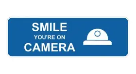 196703021937 SIGNS BYLITA Standard Smile Youftre Camera Sign